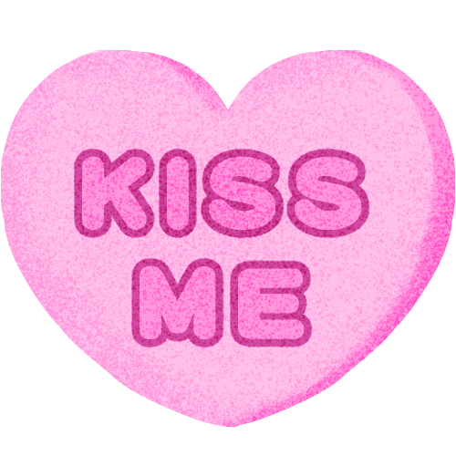 pink candy heart that reads kiss me